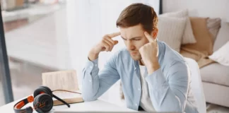 Man focusing while working.