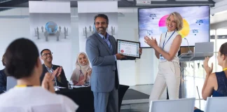 Man receiving award for best performance of the year.