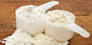 close up shot of protein powder in a scoop
