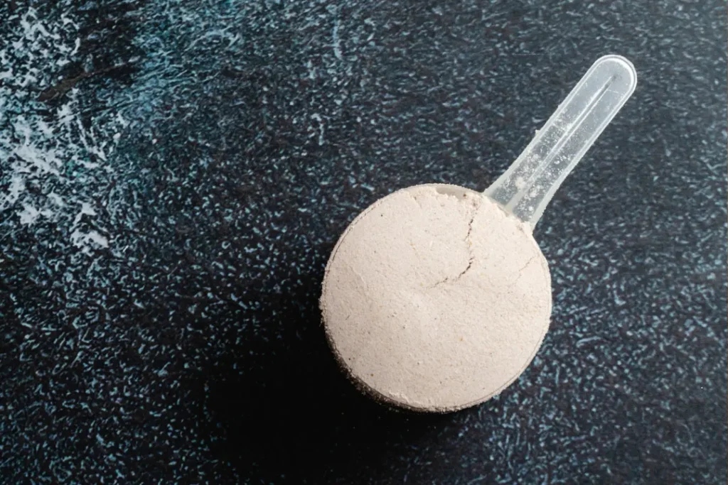 Premier protein powder in scoop