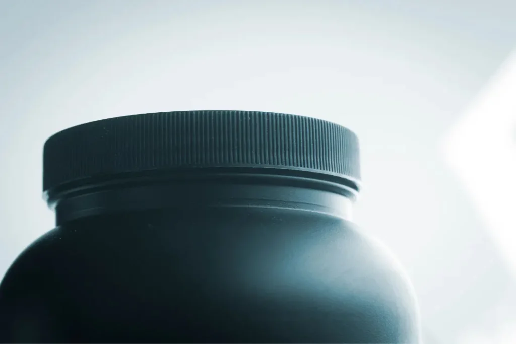 close up shot of level 1 protein powder bottle
