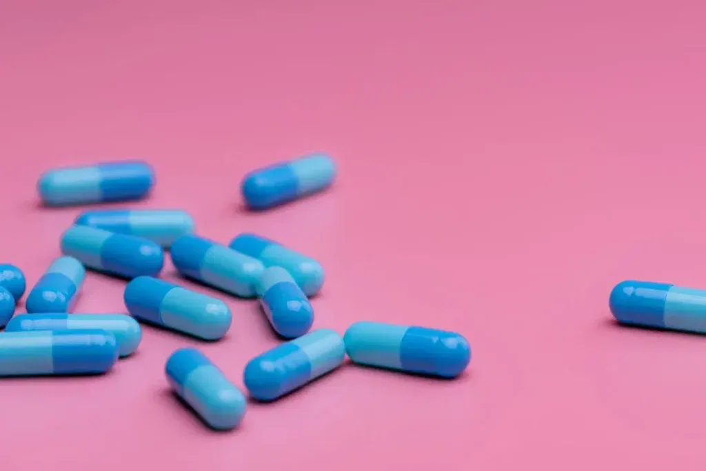 pills on a pink background